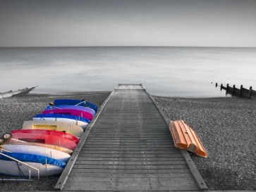 Assaf Frank - Kayaks on the side of pier