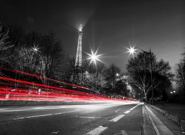 Assaf Frank - Strip lights on a road next to the Eiffel tower
