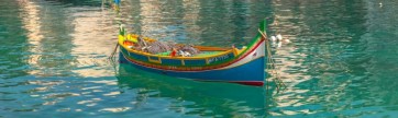 Assaf Frank - Colorful Maltese boats in St Julians bay, Malta