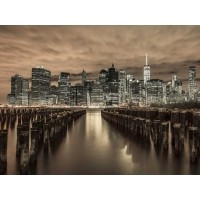Assaf Frank - Manhattan skyline with rows of groynes in foreground, New York