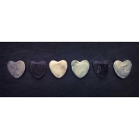 Assaf Frank - Heart shaped stones in a row